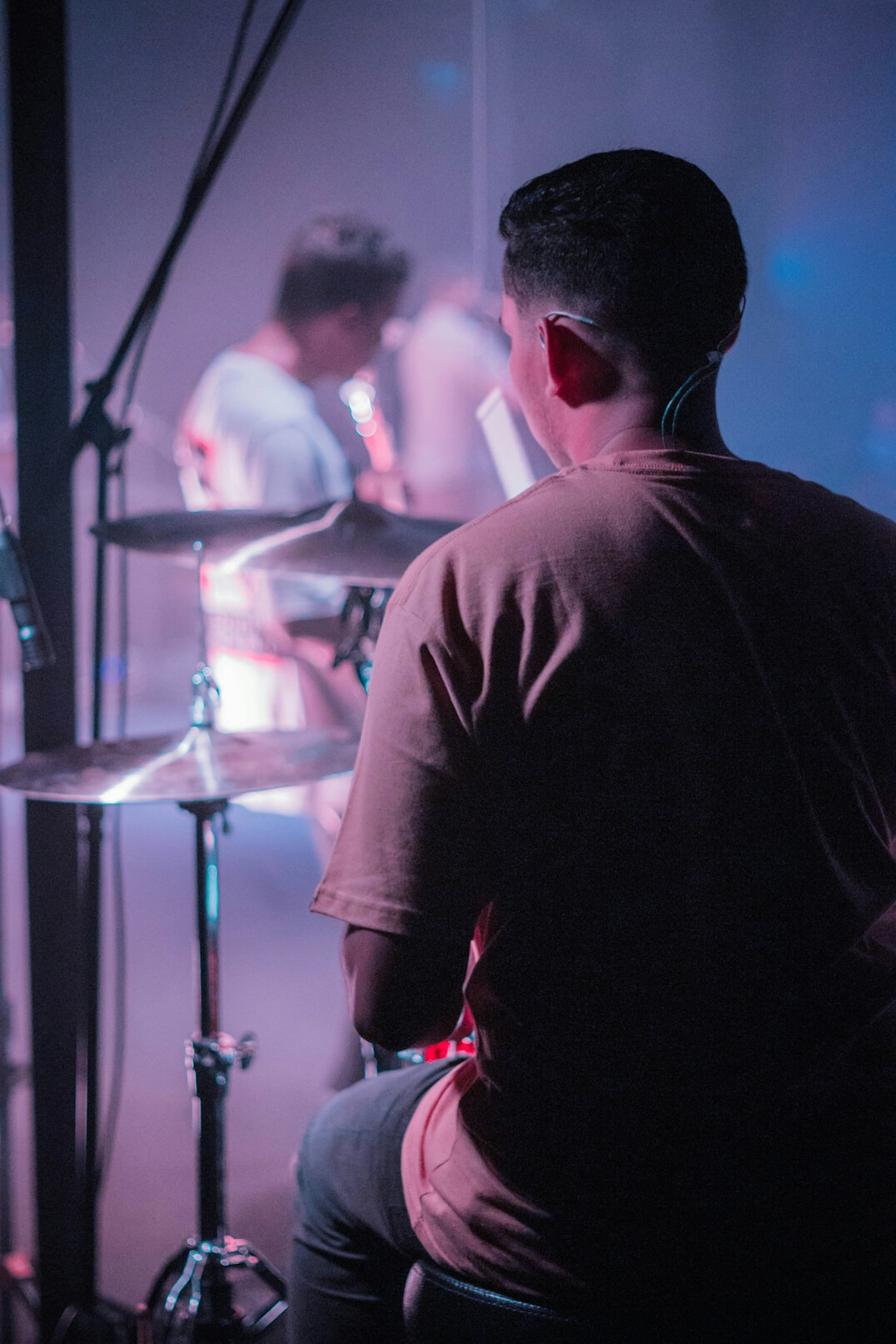 Producer taking notes during a live broadcast rehearsal